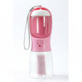 Pink and clear portable water bottle with a strap on a white background